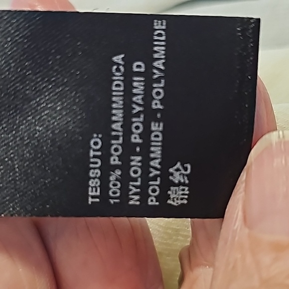 D. EXTERIOR women's fitter stretch top made in Italy. Cream color size large. - Picture 9 of 10